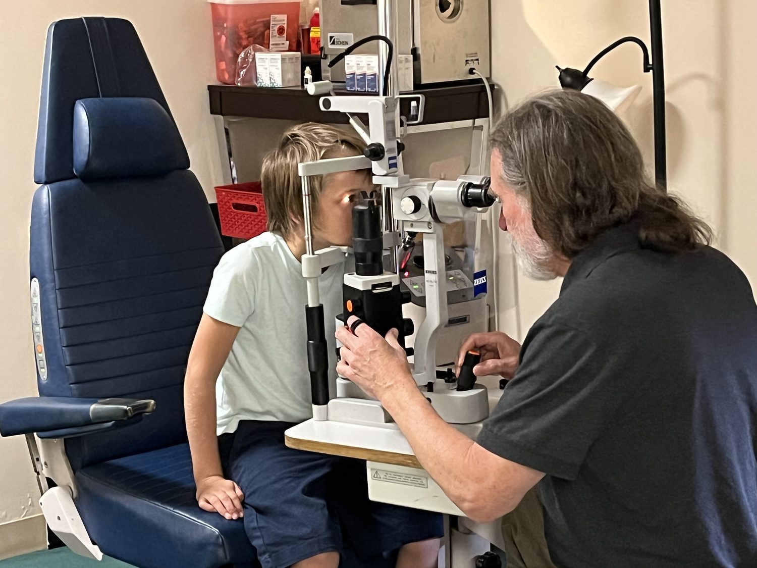 Close-up of an eye examination at the slit lamp